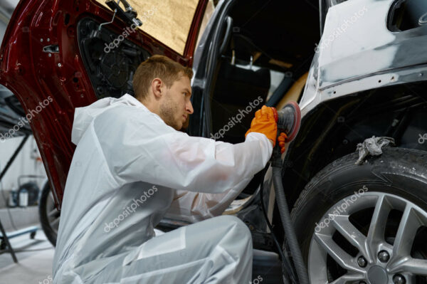 Auto painter polishing plastered car body part